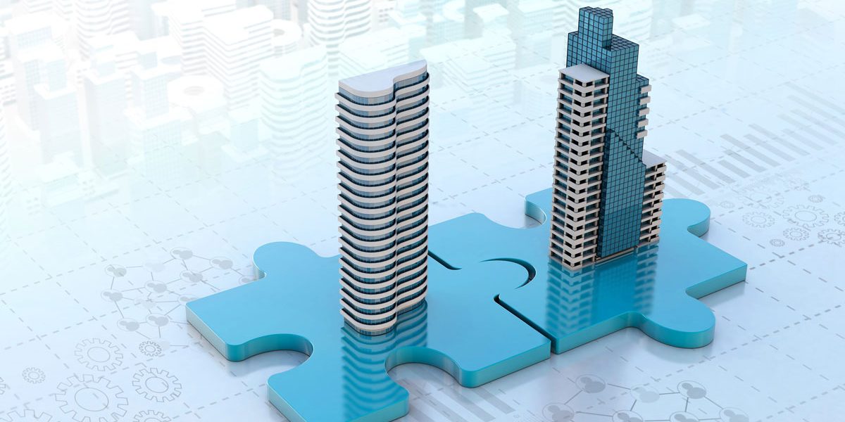 Two buildings being connected by blue puzzle pieces